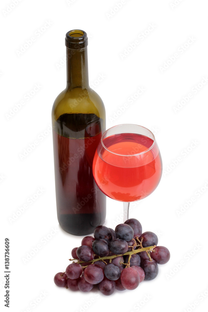 Bottle glass of wine and grapes on white background
