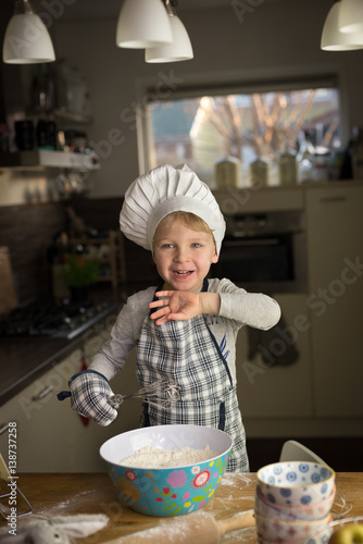 little chef having fun in the kitchen