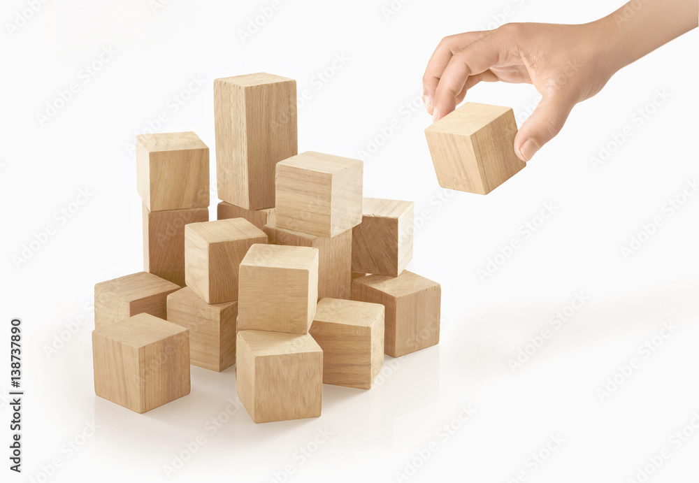 Single hand playing wooden box on isolated background. Single hand playing wooden box on isolated background.