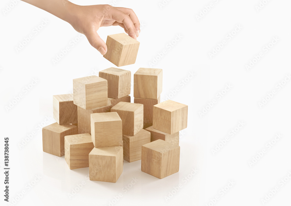 Single hand playing wooden box on isolated background. Single hand playing wooden box on isolated background.