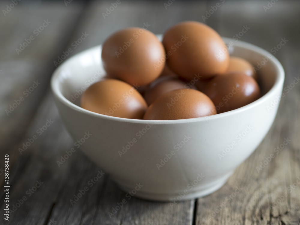 eggs in white bowl eggs in white bowl
