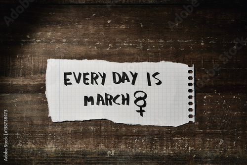 text every day is march 8 in a piece of paper photo