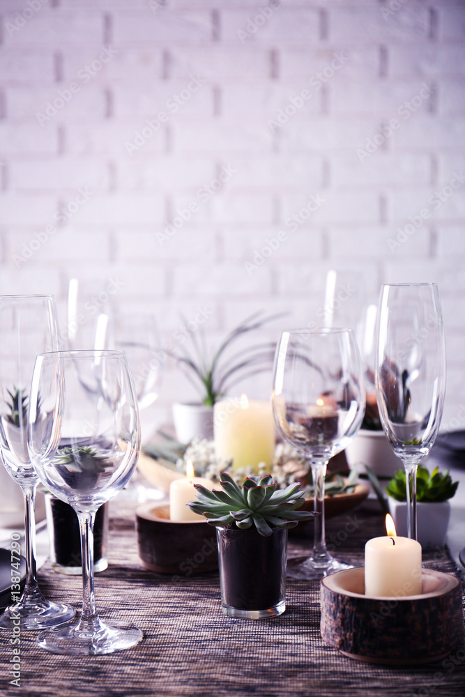 Table served with succulents for dinner in living room Table served with succulents for dinner in living room