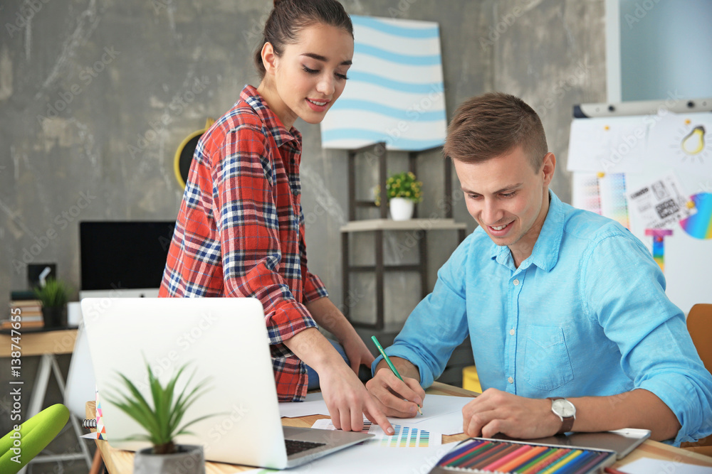 Obraz premium Two young designers at workplace