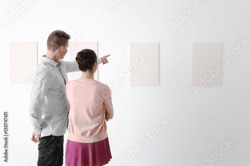 Young couple at art gallery