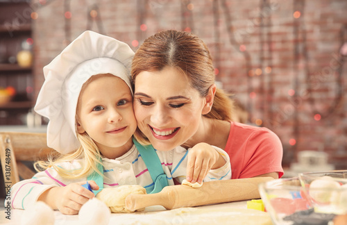 Young mother with daughter ...