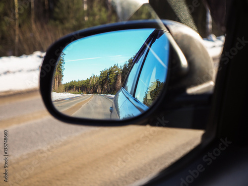 look in the rearview mirror of a car   © evgenius1985