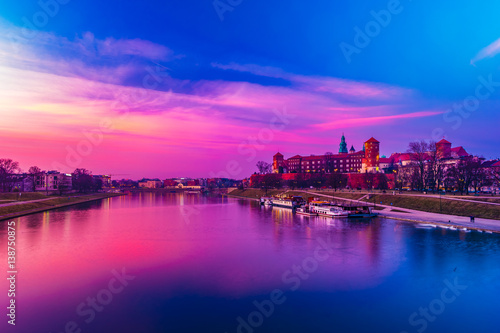 Royal castle of the Polish kings on the Wawel hill, over the Vistula river in the evening, Krakow, Poland © romas_ph