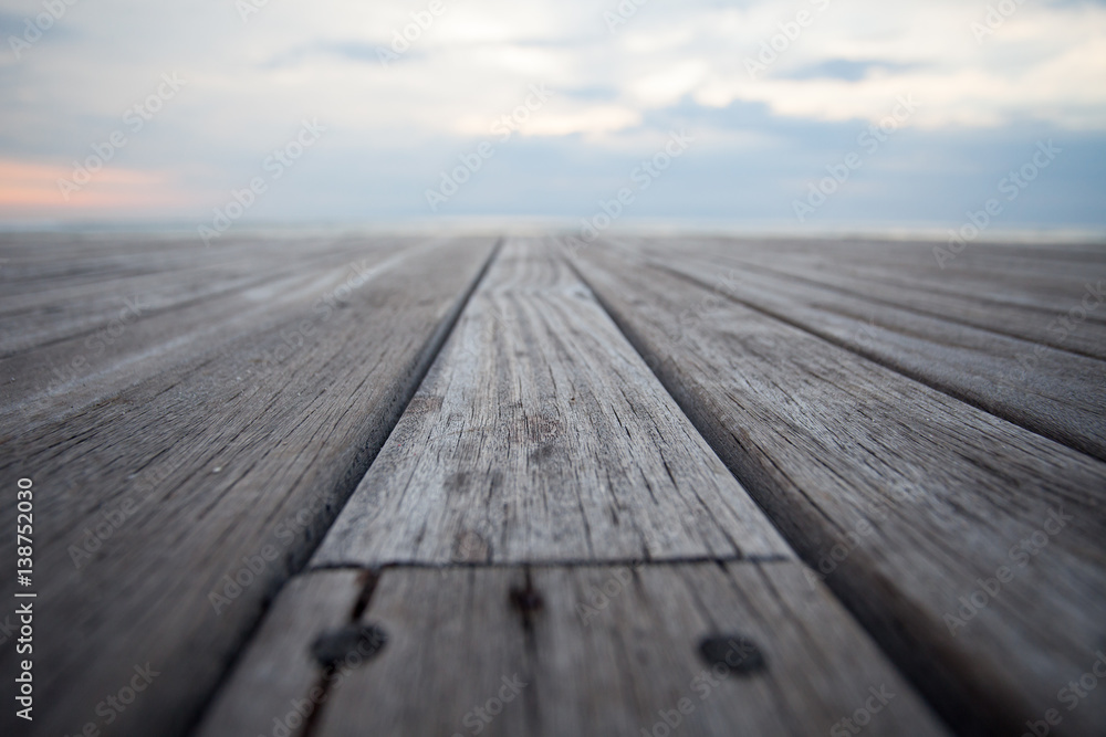 Close up old wooden flooring and tropical beach Close up old wooden flooring and tropical beach