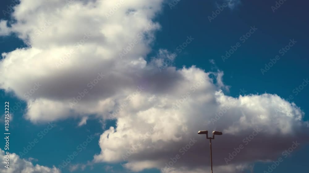 Timelapse of sunny day with rolling clouds in the sky 4K ULTRAHD Timelapse of sunny day with rolling clouds in the sky 4K ULTRAHD