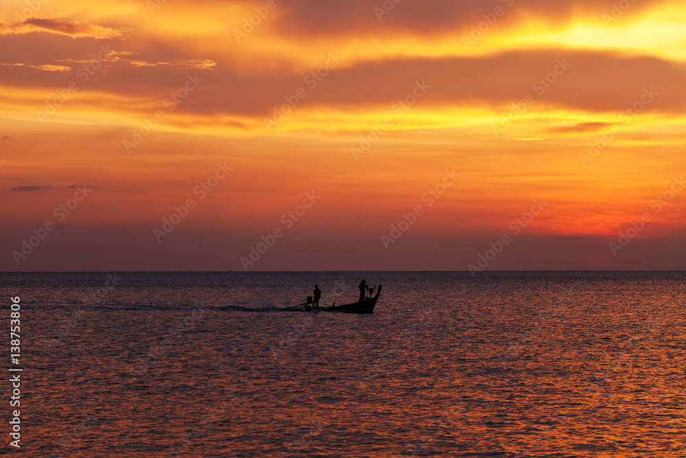 Fishing boat at beautiful sunset