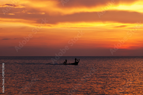 Fishing boat at beautiful sunset
