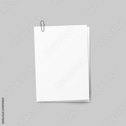 Realistic several sheets of paper and a metal paper clip isolated on background. 3d Vector illustration 