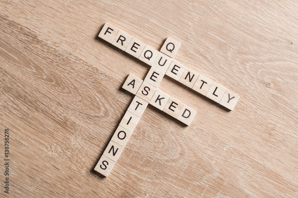 Frequently Asked Questions concept collected of wooden cubes on business workplace Frequently Asked Questions concept collected of wooden cubes on business workplace