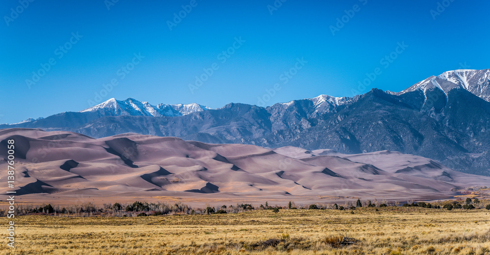 Great Sand Dunes National Park and Preserve is a United States National Park located in the San Luis Valley, in the easternmost parts of Alamosa County and Saguache County, Colorado, United States