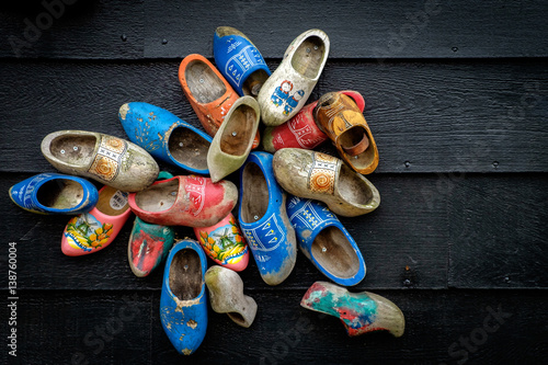 Traditional dutch wooden shoes mounted on a wall