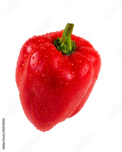 Isolated fresh red paprika with water drops 