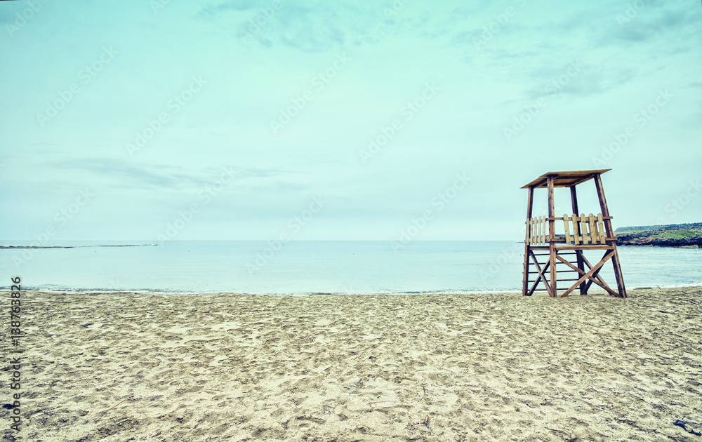 Empty sandy beach with lifeguard tower, Crete, Greece. Empty sandy beach with lifeguard tower, Crete, Greece.