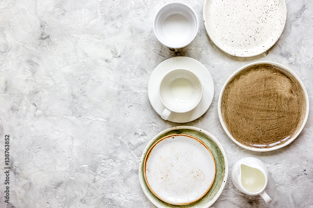 ceramic tableware top view on stone background mock up ceramic tableware top view on stone background mock up