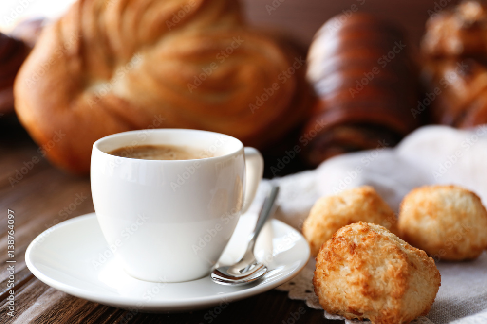 Cup of coffee and different bakery products Cup of coffee and different bakery products