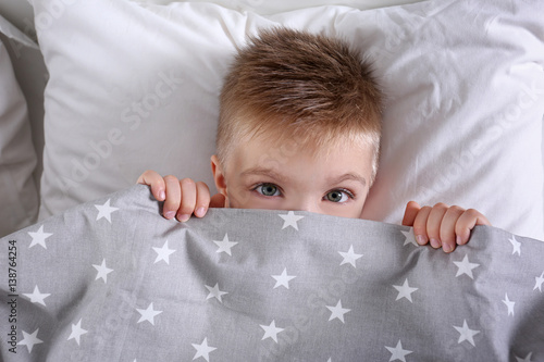 Little boy in bed