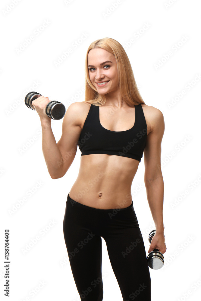 Young athletic woman with dumbbells isolated on white Young athletic woman with dumbbells isolated on white