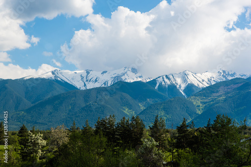 Mountain peaks covered with snow after the winter season