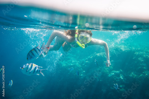 girl engaged in snorkeling in the Red Sea in Egypt