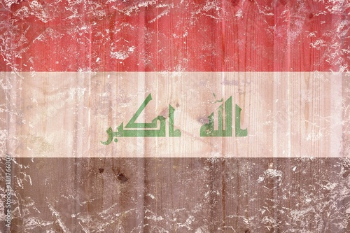 Iraq flag background  on wooden planks