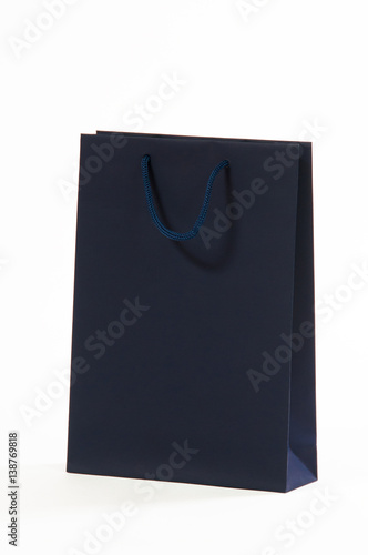 Dark blue, black paper bag on a white background