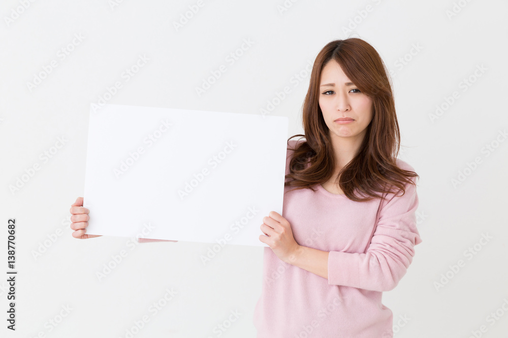 ホワイトボードを持つ女性 考える ホワイトボードを持つ女性 考える