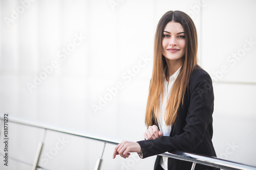 young businesswoman at office balcony photo