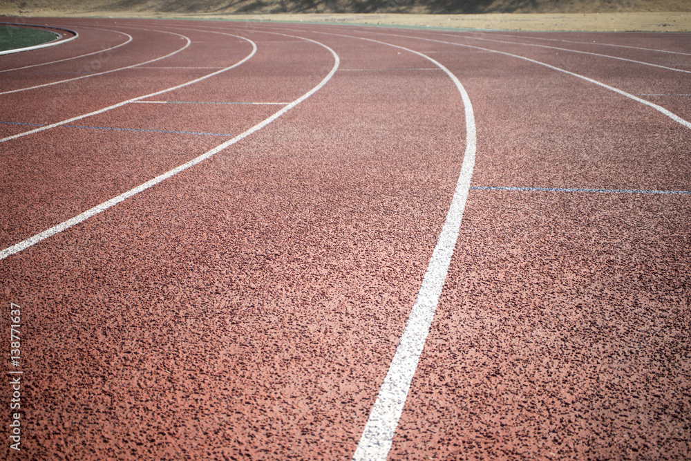 the running track on the stadium. for usage of background, I intentionally defocused the running track on the stadium. for usage of background, I intentionally defocused