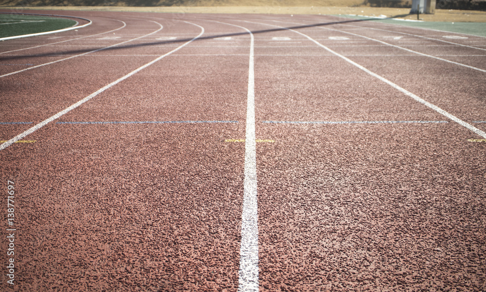 the running track on the stadium. for usage of background, I intentionally defocused the running track on the stadium. for usage of background, I intentionally defocused