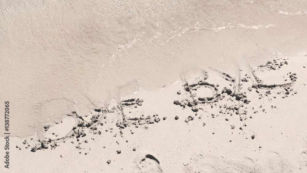 Bye bye writing on the sand being deleted by waves Bye bye writing on the sand being deleted by waves
