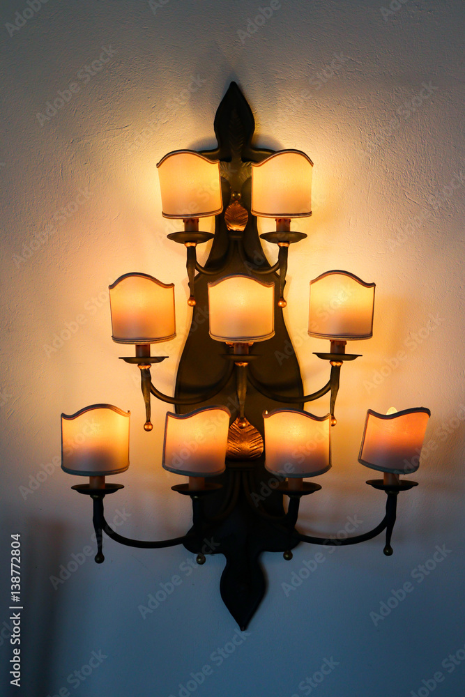antique style lights on the wall. it pretends the candle lights in middle ages but there's light bulb. antique style lights on the wall. it pretends the candle lights in middle ages but there's light bulb.
