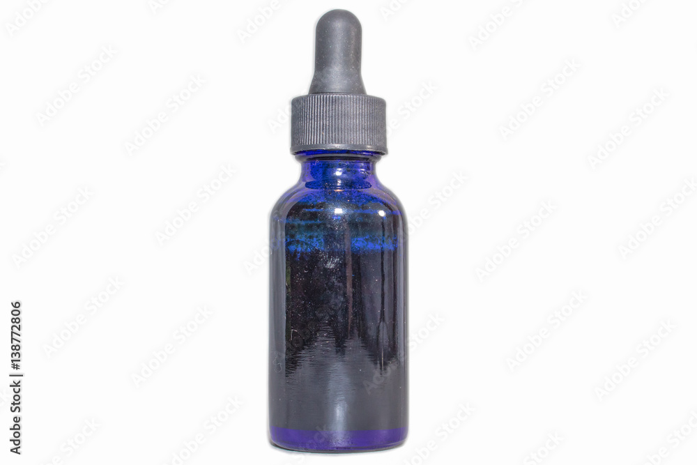 Blue Bottle With Fluid Isolated Against White Background Blue Bottle With Fluid Isolated Against White Background