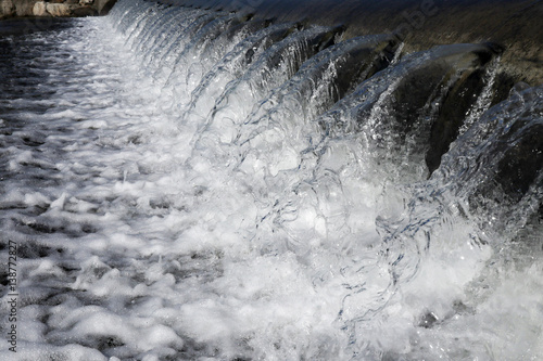 the waters are falling off on the river photo