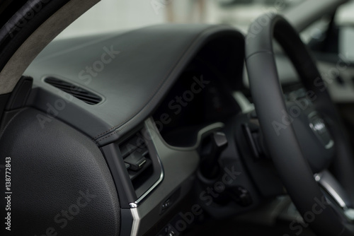 Modern car leather dashboard. Interior detail.