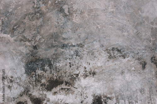 Grunge texture of concrete wall with white and grey spots © ArinaEmelyanova