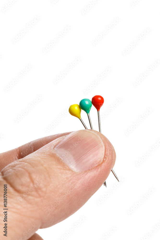 hand holding pins hand holding pins