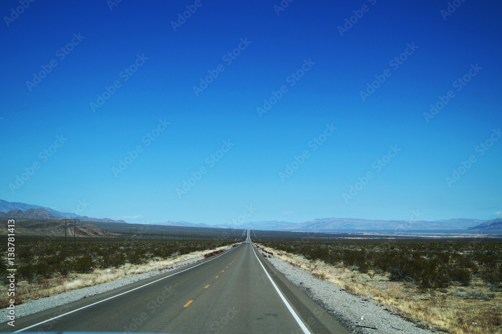 Beautiful view of road with mountain view in the spring time. Landscape of state Nevada, USA