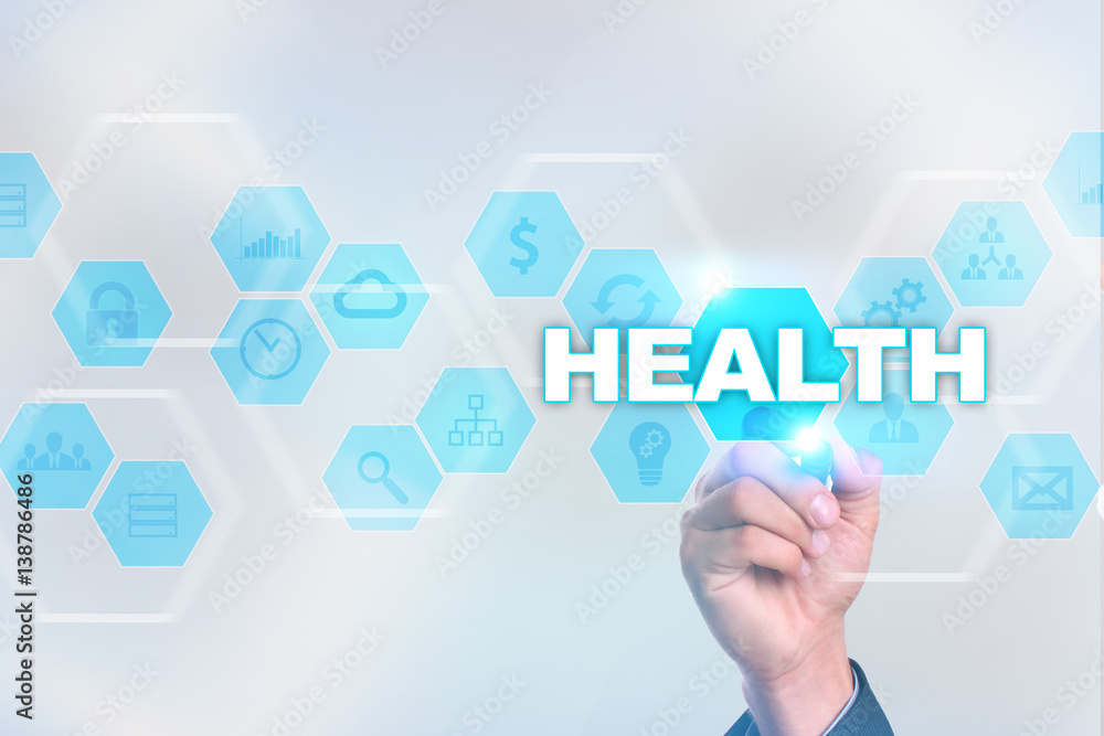 Medical doctor drawing health on the virtual screen. Medical doctor drawing health on the virtual screen.