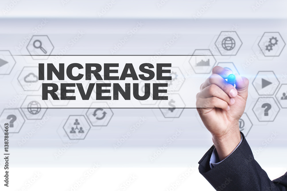 Fototapeta premium Businessman drawing on virtual screen. increase revenue concept.