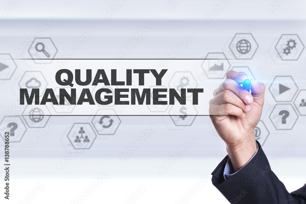 Businessman drawing on virtual screen. quality management concept. Businessman drawing on virtual screen. quality management concept.