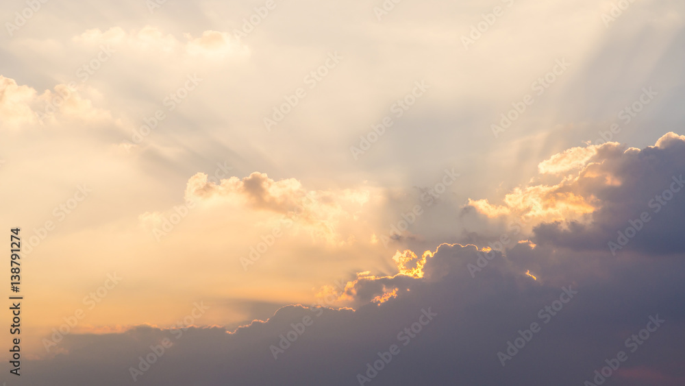 Sunset behind the cloud and orange sky