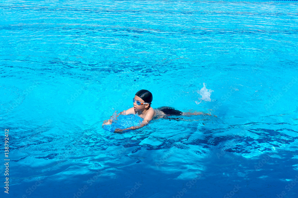 Asian Boy Practice Swimming.