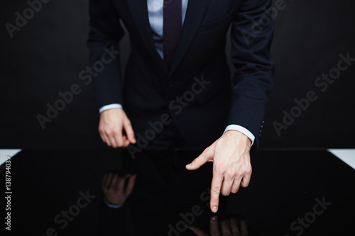 Картината върху платно Closeup portrait of unrecognizable authority figure wearing business suit standi