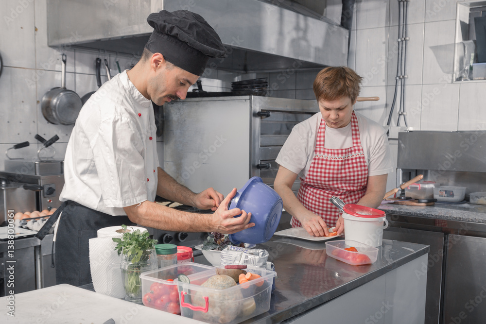 two people, chef cooking food, commercial kitchen