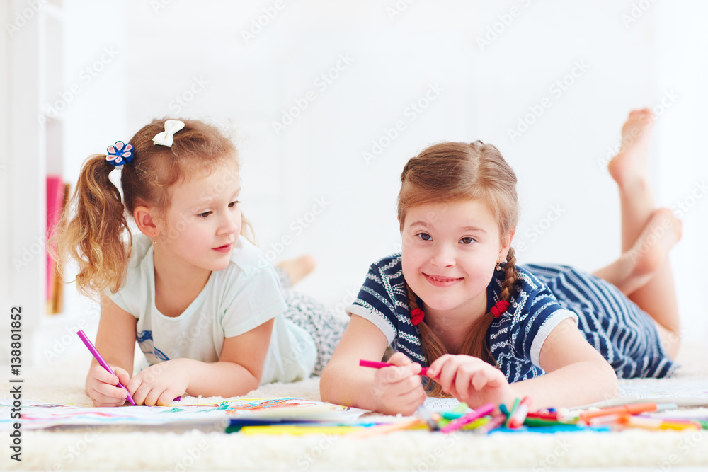 happy young girls, kids painting with felt pen together happy young girls, kids painting with felt pen together
